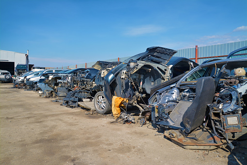 car parts and scrap in a junkyard