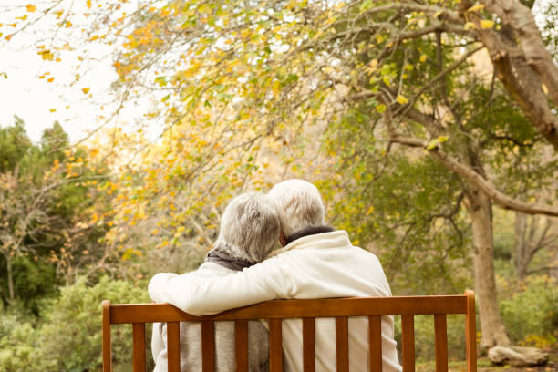 istock Senior couple in the park 664343742