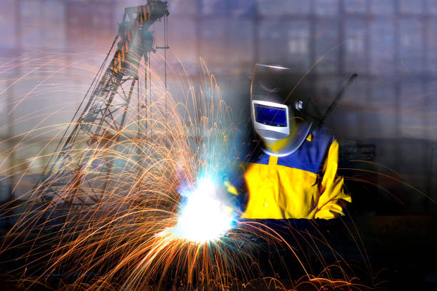 istock Industrial worker , Electric Grinders metal and many sharp sparks ,construction site concept . 664343884
