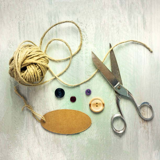 istock Vintage scissors, twine, and tag with copyspace 664348126