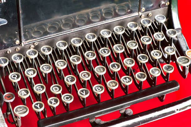 istock Old retro black metallic typewriter with antique round  keys. 664348460