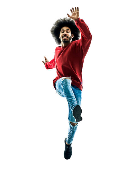 one african man running jumping saluting in silhouette isolated on white background
