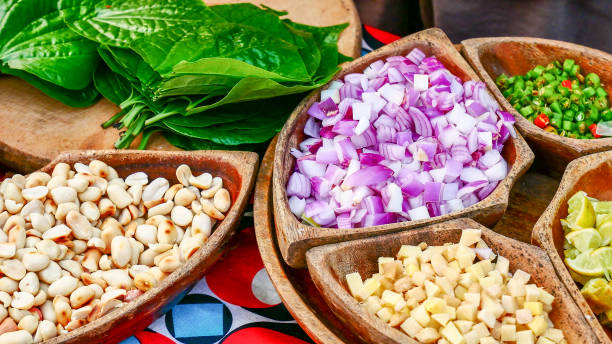 istock Miang Kham : Thailand's royal leaf wrap appetizer served with Pork Rind on Banana Leaves 664360484