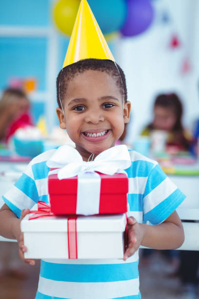 istock Happy kids at a birthday party 664362762