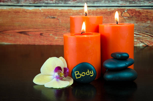 istock lava stones and burning candles 664378560
