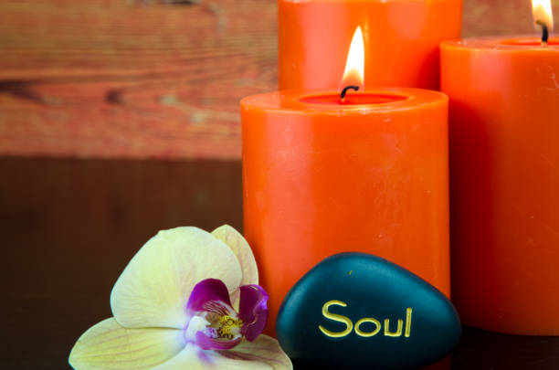 istock lava stones and burning candles 664378604