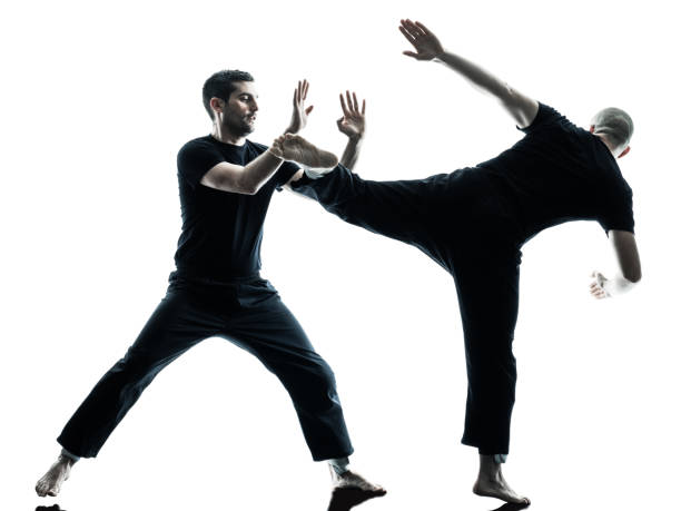 istock men krav maga fighters fighting isolated 664381980