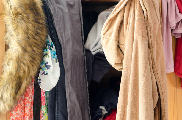 istock Pile of carelessly scattered clothes in wardrobe 664382770