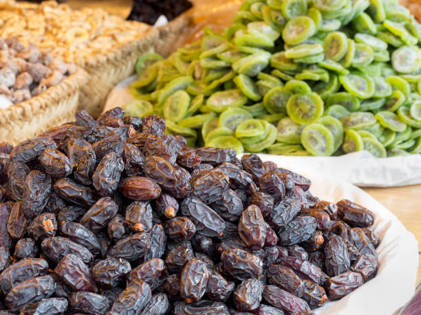 istock Dates, next to candied kiwi fruit. 664383284