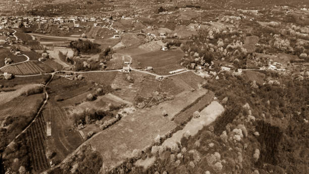 istock Aerial view of hilly countryside with fields ready for seeding. 664386636