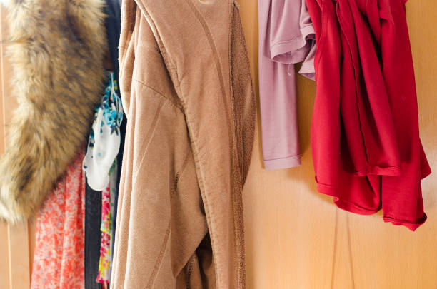 istock Pile of carelessly scattered clothes in wardrobe 664386822