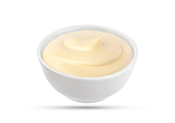 istock Mayonnaise sauce in bowl isolated on white background with clipping path 664389250