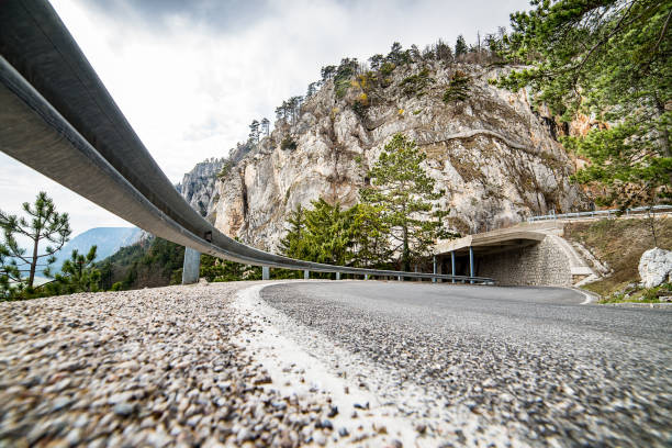 road to a mountain - wide angle lens - Hohe Wand - Niederösterreich - low angle with a mountain in the background