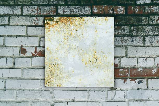 istock Background of rusty metal frame on brick wall 664390090