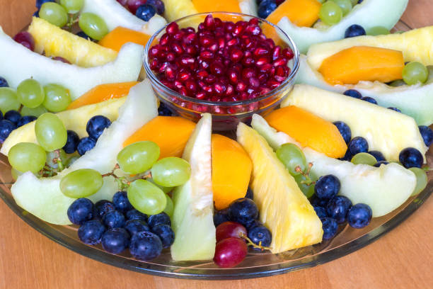 istock Glass scale full of various fresh fruits 664390628