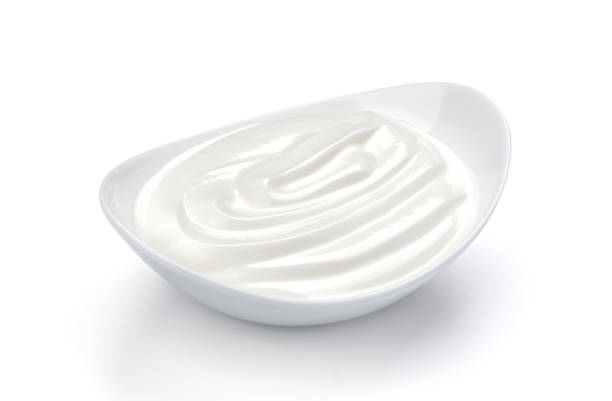 istock Sour cream in bowl isolated on white background 664390722