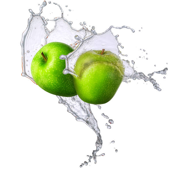 istock Water splashes with green apples isolated 664393824