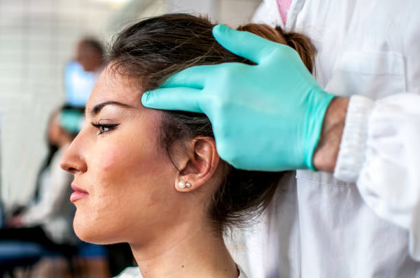 istock dental examination for cervical pain 664394354