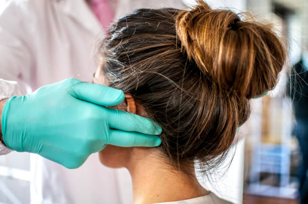 istock dental examination for cervical pain 664394372