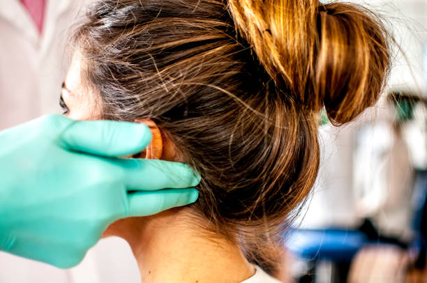 istock dental examination for cervical pain 664394376