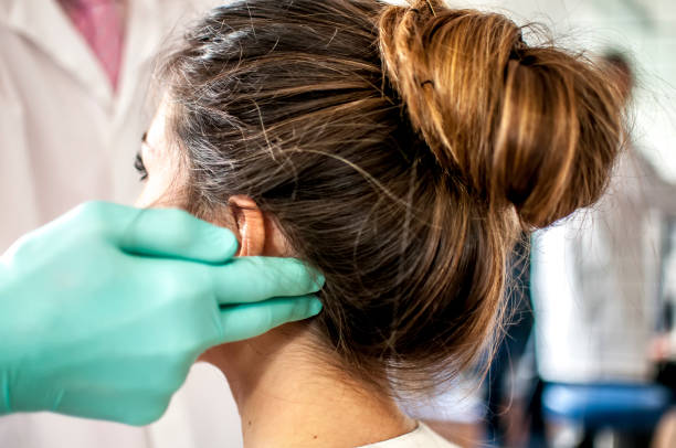 istock dental examination for cervical pain 664394388