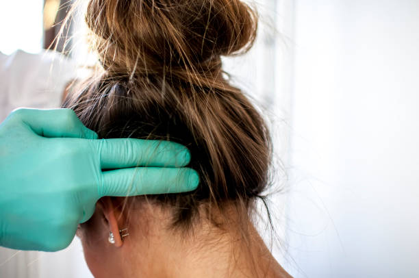istock dental examination for cervical pain 664394502