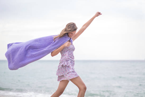 istock Pretty girl on the beach 664398810