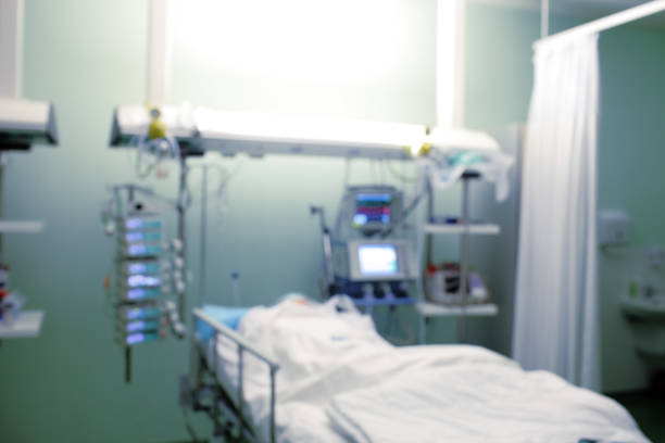 istock Patient in ICU, defocused medical background 664406628