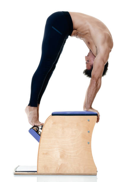 istock man fitness pilates exercices isolated 664409538