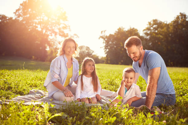 istock Family with children on picnic 664410270