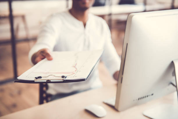 istock Afro American businessman working 664413298