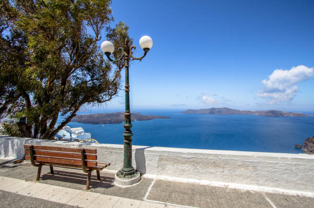 istock Bench and sea on Satorini island 664414120