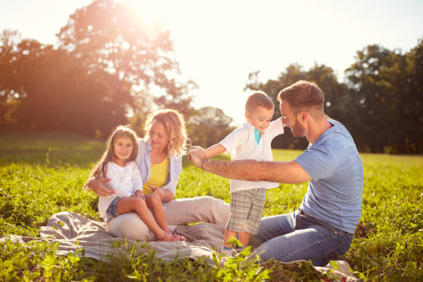 istock Family on picnic in park 664414234