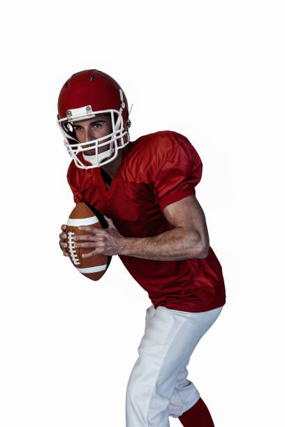 istock Player holding rugby ball and posing 664417980