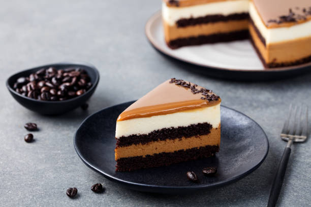 istock Caramel cake, mousse dessert on a plate. Grey stone background 664418208