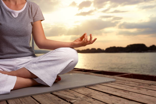 istock Woman in lotus pose, concept 664418282