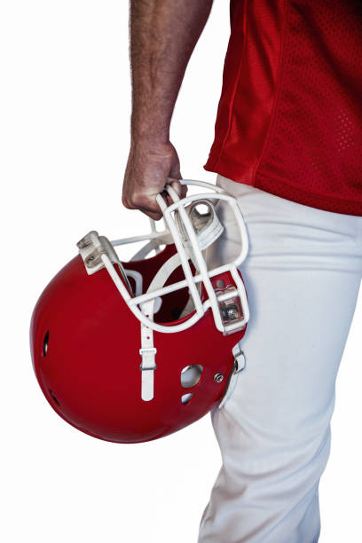 istock Midsection of rugby player holding helmet 664420468