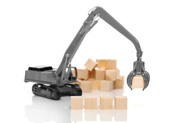 istock Crane and blank wooden cubes 664420854
