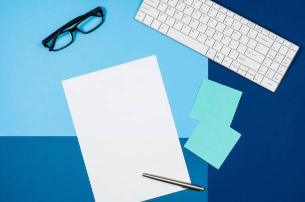 istock Mock-up blank page or magazine on colorful background top view 664421230
