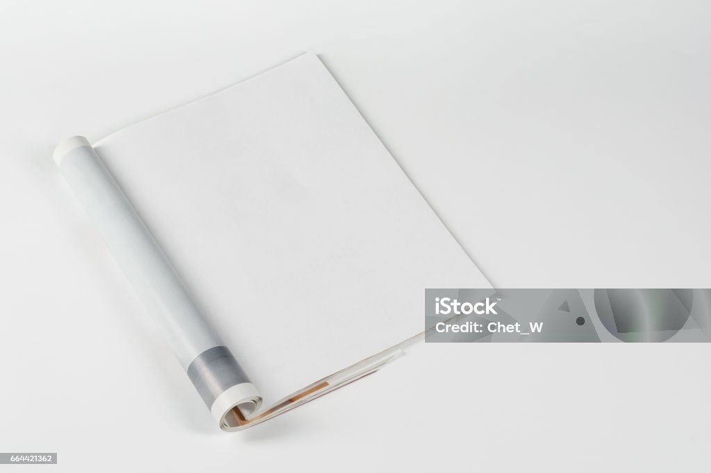 Mock-up magazines or catalog on white table background. Mock-up magazine or catalog on white table. Blank page or notepad on neutral background. Blank page or notepad for mockups or simulations. Magazine - Publication Stock Photo