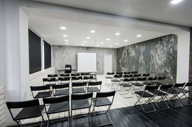istock Modern university group study room with white desk and chairs 664421610