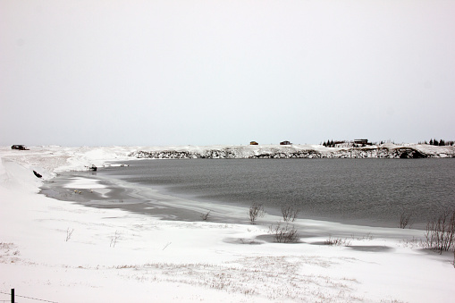 Frozen lake into the wild