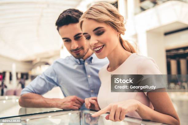 Couple Buying Jewelry Stock Photo - Download Image Now - Shopping, Jewelry, Ring - Jewelry