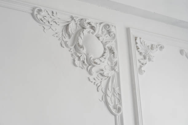 istock White wall molding with geometric shape and vanishing point. Luxury white wall design bas-relief with stucco mouldings roccoco element 664424312