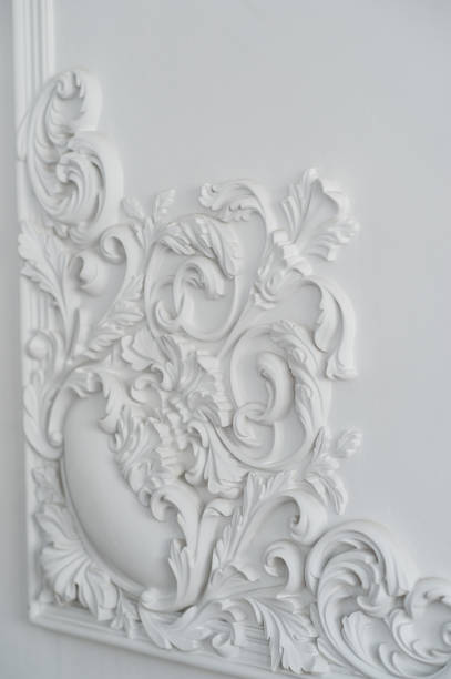istock Luxury white wall design bas-relief with stucco mouldings roccoco element 664424450