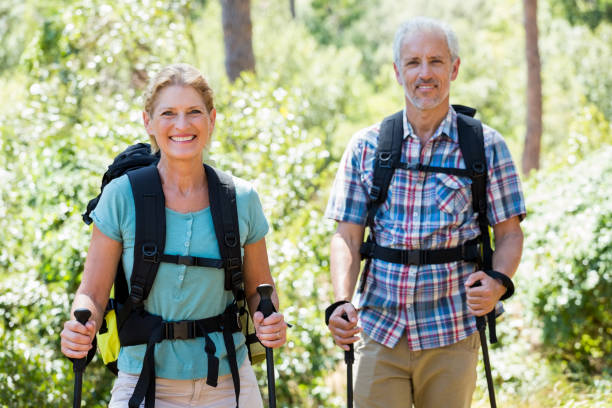 istock Senior couple standing with their stick 664427624