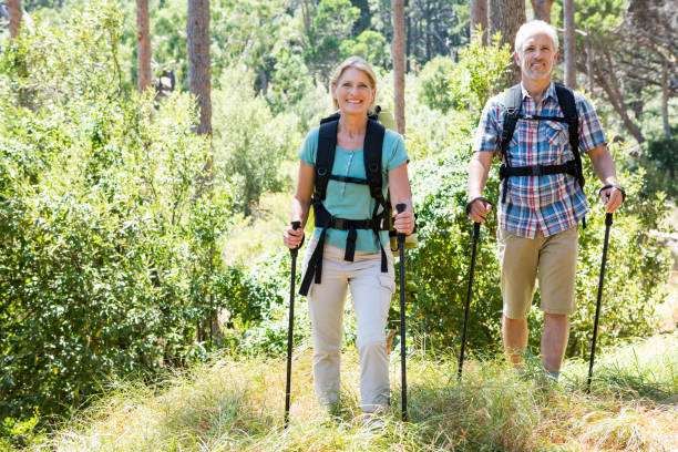 istock Senior couple standing with their stick 664428154