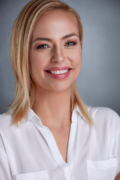 istock Attractive middle-aged blond woman with a beautiful smile 664431120