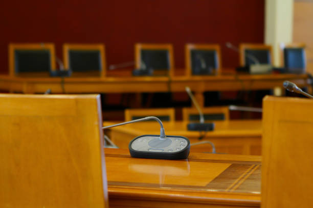 istock boardroom with microphones,bearings and chairs 664431464