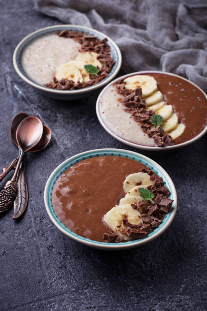 istock Banana and chocolate smoothie bowl 664431842